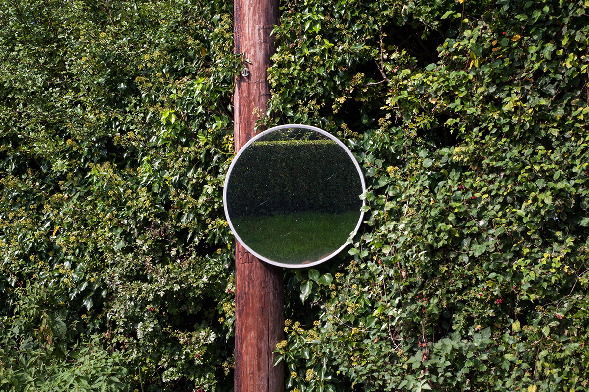 A convex roadside mirror, Alfrick, Worcestershire