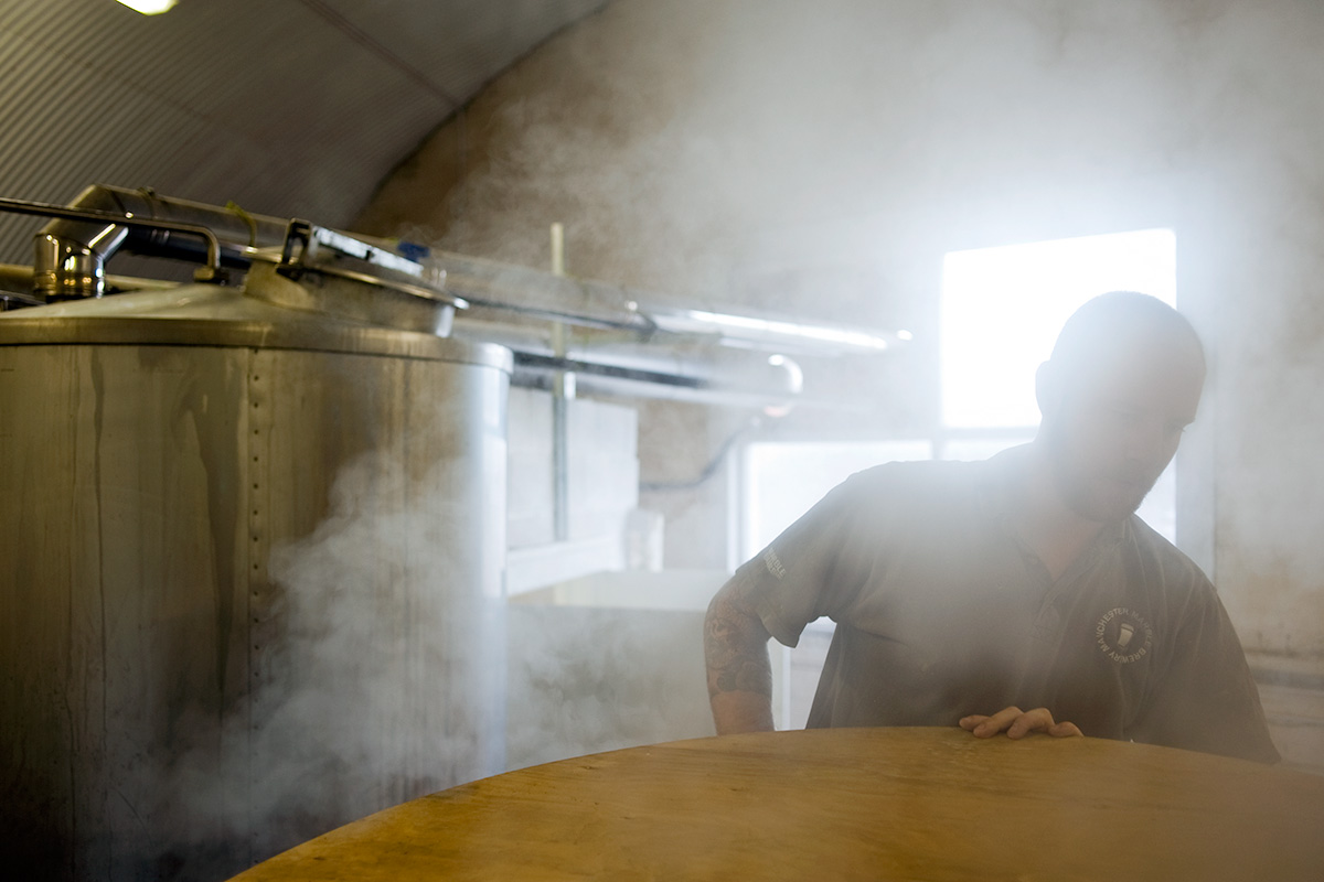 Steam from the mash tun enveloping Colin Stronge at Marble Beer's new brewery