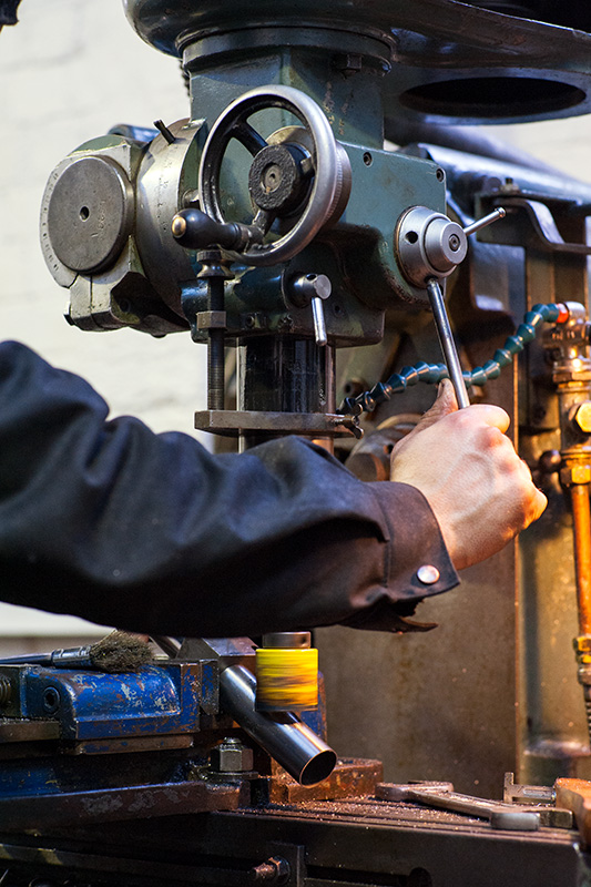 Ted James cutting a seat tube on a milling machine