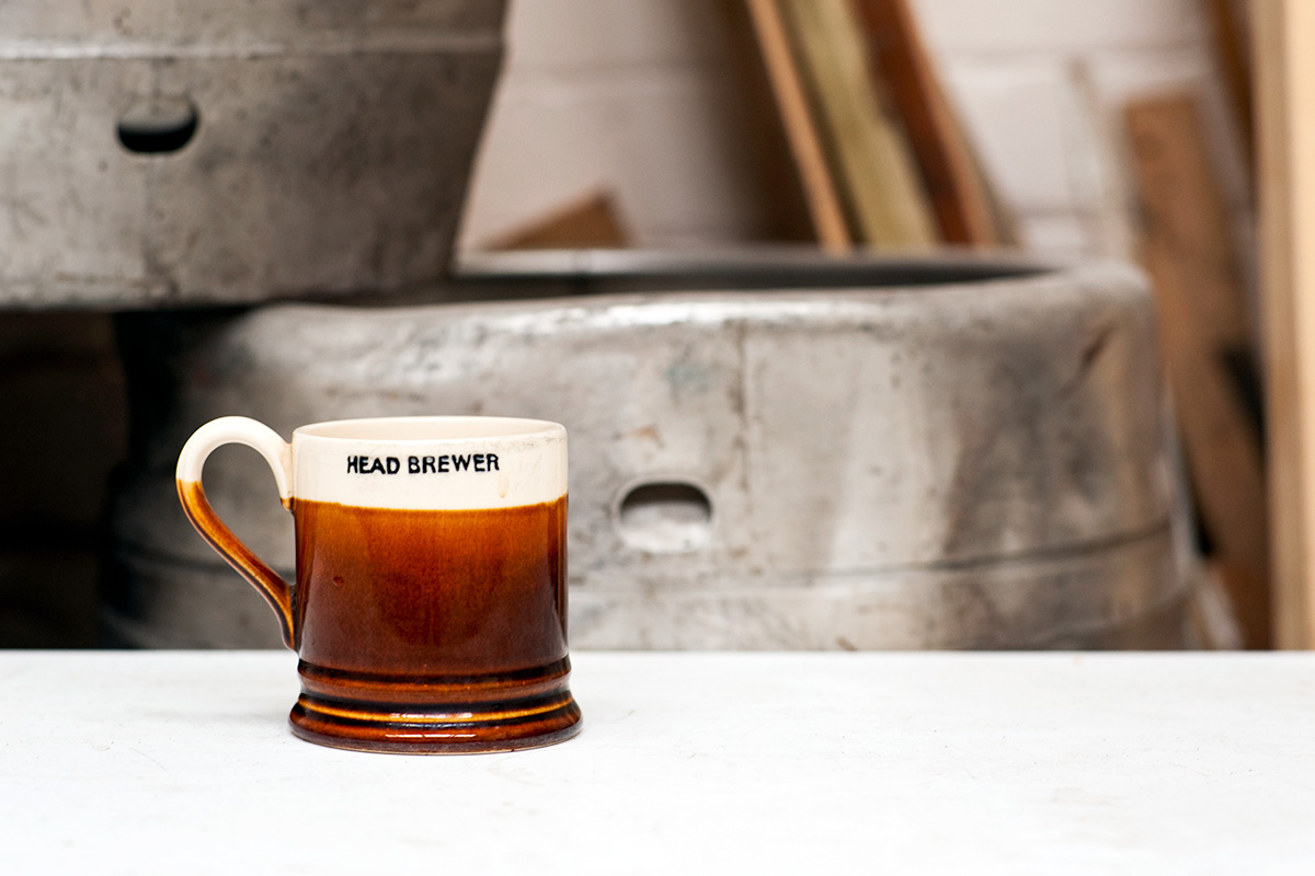 A mug bearing the text Head Brewer at Quantum Brewery, Stockport