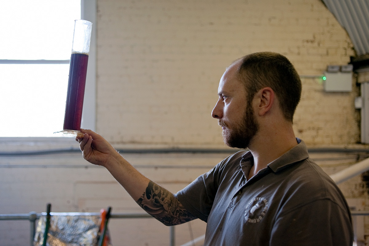 Colin Stronge examining the wort at Marble Brewery