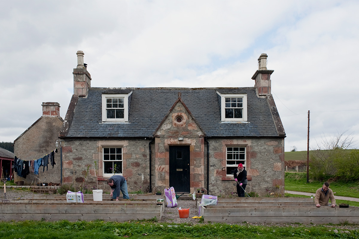 Digging vegetable beds outside Old Allangrange Farm Cottage