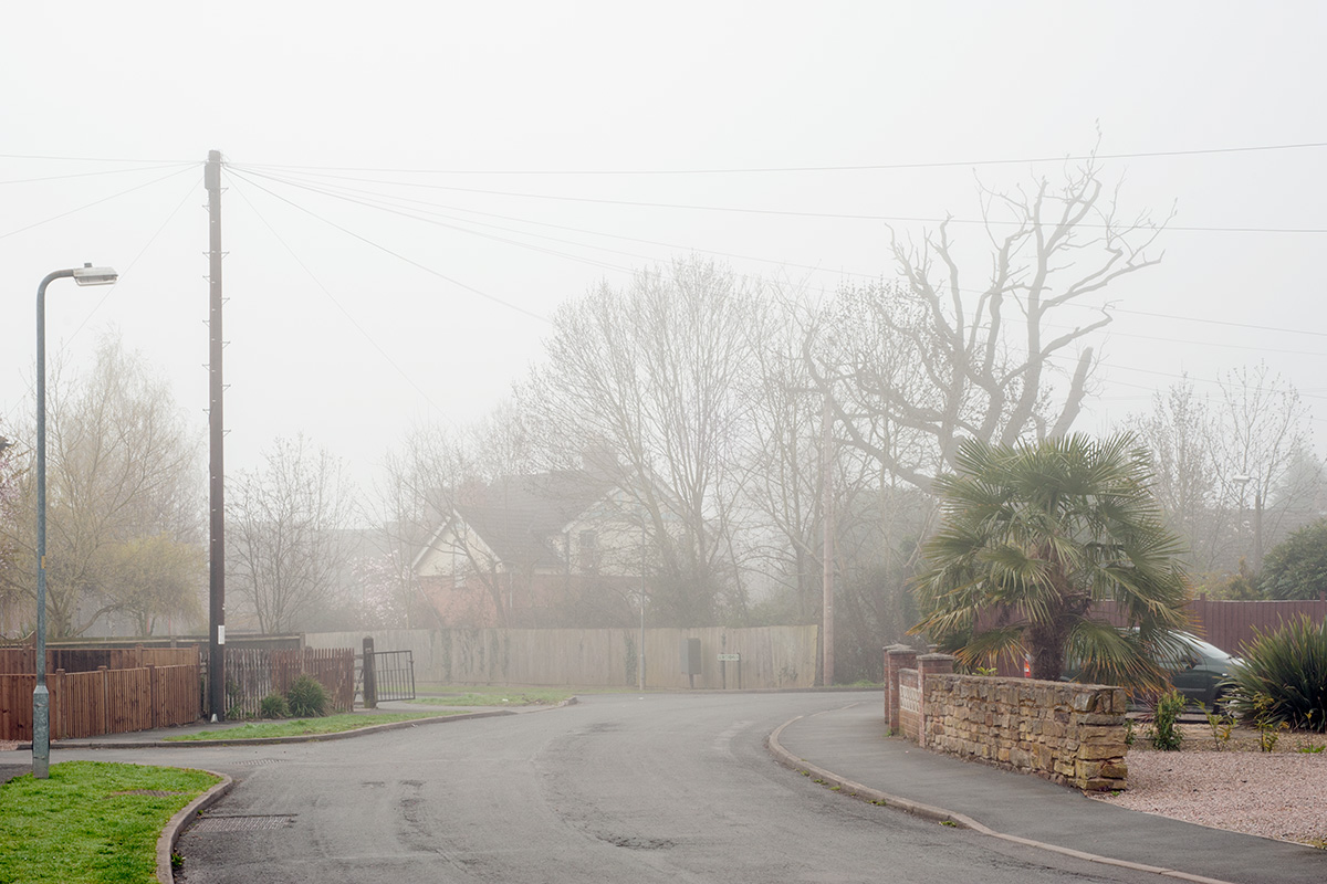 Residential street in Barnards Green in fog