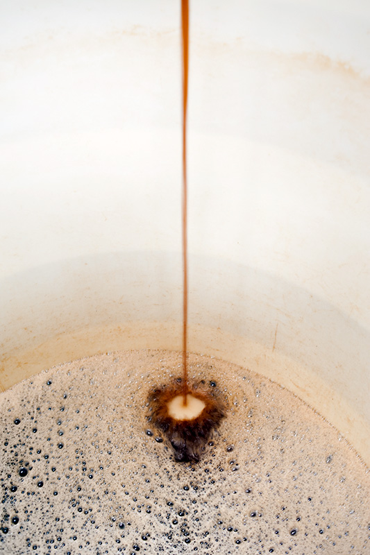 Wort entering a fermenting vessel, Quantum Brewery