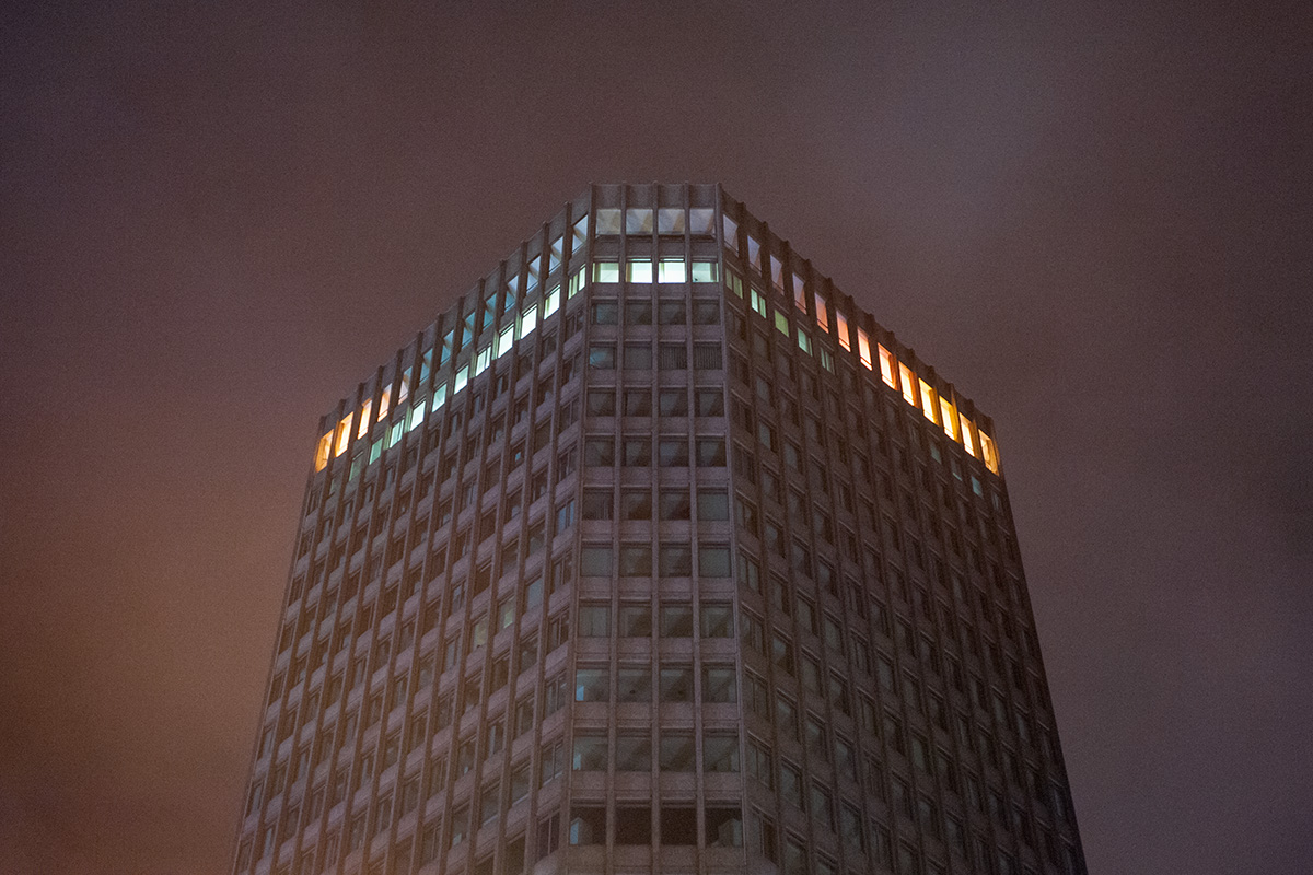 Capital Tower, Cardiff, with light polution illuminating passing rain clouds