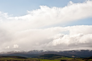 The fields and snow covered peaks of the Black Isle