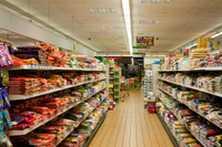 The spice aisle of Worldwide Stores, Rusholme, seen shortly before closing for the evening
