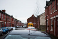 Ribbon tied to a car aerial in Rusholme, Manchester
