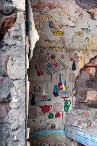 1950s and 1960s wallpaper in a house undergoing renovation in Audenshaw, Greater Manchester