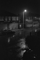 Withington during a thunderstorm, reminiscent of film noir