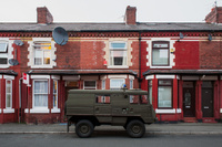 A Pinzgauer 710K Swiss army truck parked in a residential street in Rusholme, Manchester