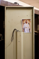 A locker decorated with a postcard of Jesus