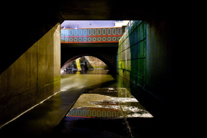 The end of a culverted section of the River Medlock