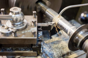 A headtube being cut on a lathe at Ted James Design, Stroud