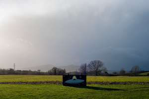 An alien face-in-hole board in a field near Worcester