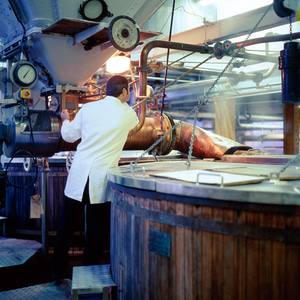 A brewer starting the mash